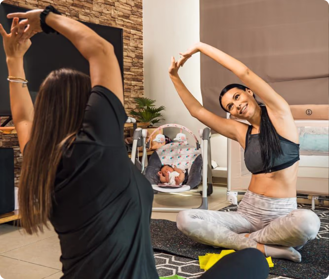 PTD team member stretching and smiling